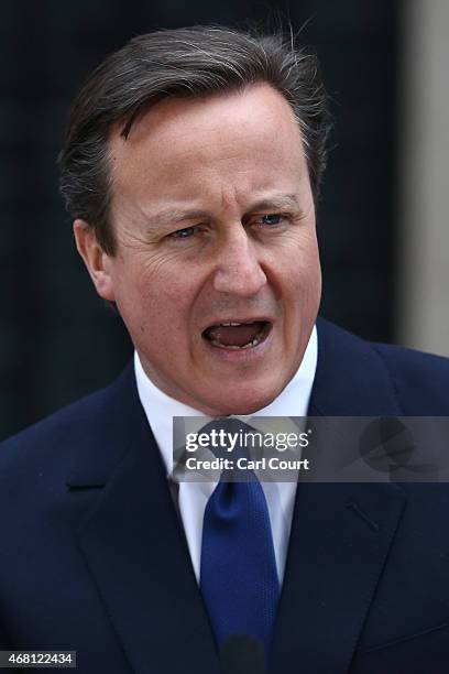 British Prime Minister David Cameron speaks in front of 10 Downing Street after meeting with Queen Elizabeth II on March 30, 2015 in London, England....