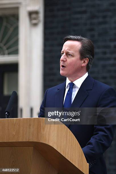 British Prime Minister David Cameron speaks in front of 10 Downing Street after meeting with Queen Elizabeth II on March 30, 2015 in London, England....