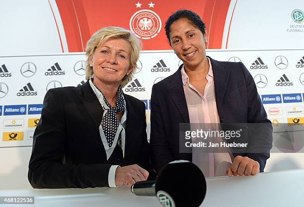 German Women's head coach Silvia Neid and new Women's head coach, from September 2016, Steffi Jones attend a Germany press conference ahead of the...