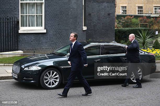 British Prime Minister David Cameron arrives to speak in front of 10 Downing Street after meeting with Queen Elizabeth II on March 30, 2015 in...