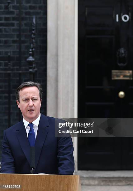 British Prime Minister David Cameron speaks in front of 10 Downing Street after meeting with Queen Elizabeth II on March 30, 2015 in London, England....