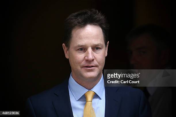 Deputy Prime Minister Nick Clegg leaves Downing Street for Buckingham Palace to attend a private audience with Queen Elizabeth II and a meeting of...