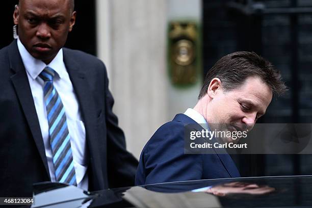 Deputy Prime Minister Nick Clegg leaves Downing Street for Buckingham Palace to attend a private audience with Queen Elizabeth II and a meeting of...