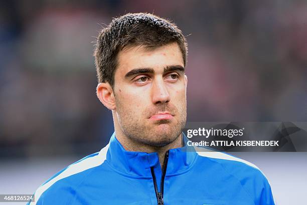 Greek defender Sokratis Papastathopoulos is seen prior to a Euro 2016 qualifying football match between Hungary and Greece at the Grupama Arena in...