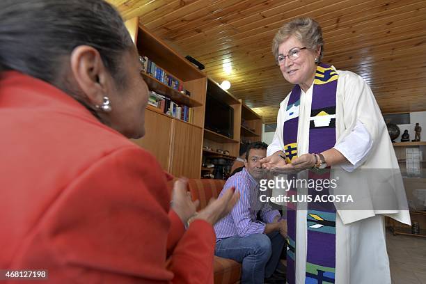 Colombian priest Olga Lucia Alvarez says mass in Bogota on March 22, 2015. Alvarez is one of four Latin American women priests, member of the Roman...