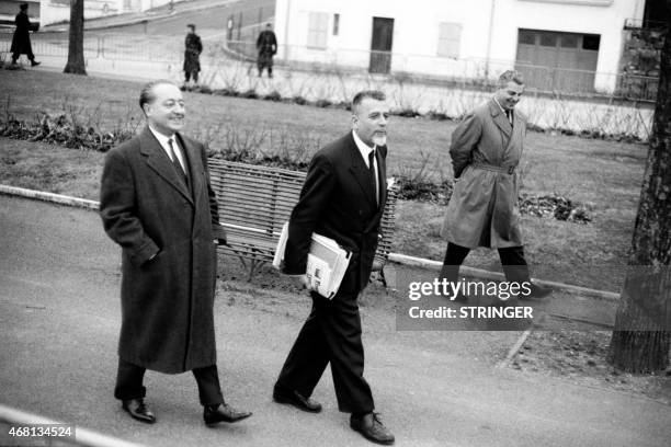 French MP Jean de Broglie and French politician Robert Buron walk on March 7, 1962 in Evian during the negotiations over the Evian Accords which was...