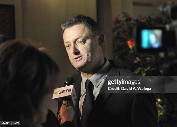 Screenwriter Jeff Pope is interviewed upon arrival at The USC Libraries 26th Annual Scripter Awards at USC on February 8, 2014 in Los Angeles,...