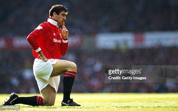 Manchester United striker Eric Cantona reacts during an FA Premier League match between Manchester United and Manchester City at Old Trafford on...