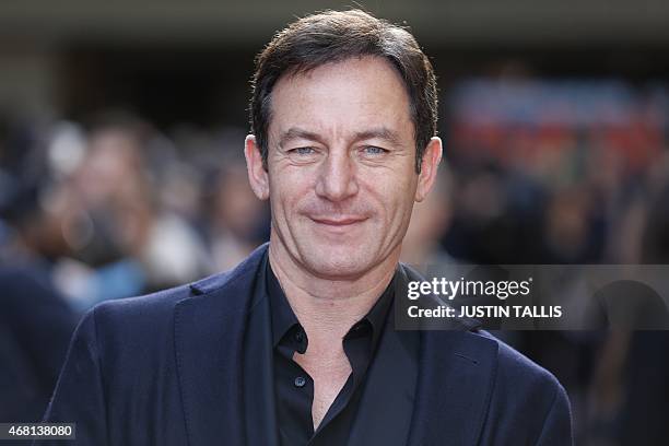 British actor Jason Isaacs poses for photographers as he arrives for the 2015 Empire Awards in central London on March 29, 2015. AFP PHOTO / JUSTIN...