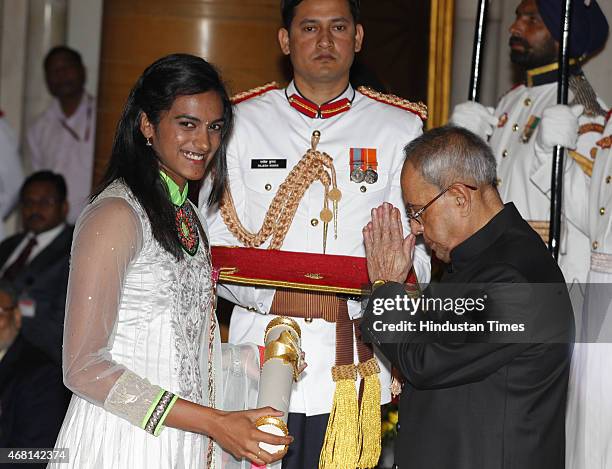 President Pranab Mukherjee presented Padma Shri award to badminton player PV Sindhu during a Civil Investiture Ceremony at Rashtrapati Bhavan on...