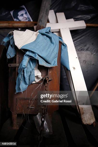 View of an Argentinian flag and crosses at the Continental Veterans Camp at Plaza de Mayo on March 27, 2015 in Buenos Aires, Argentina. Since 2008,...