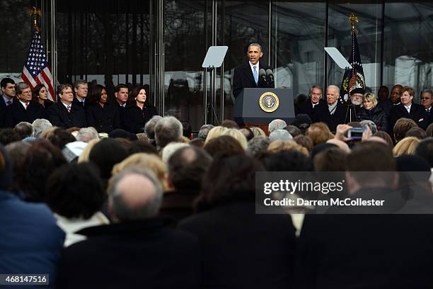 President Barack Obama speaks during the Edward M. Kennedy Institute Dedication Ceremony as Trent Lott, Tom Daschle, Edward Kennedy Jr., First Lady...