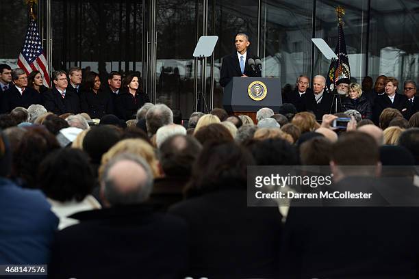 President Barack Obama speaks during the Edward M. Kennedy Institute Dedication Ceremony as Trent Lott, Tom Daschle, Edward Kennedy Jr., First Lady...