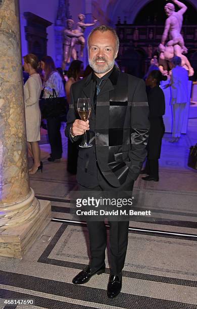 Graham Norton attends the Samsung BlueHouse private view of the 'Alexander McQueen: Savage Beauty' exhibition at the Victoria & Albert Museum on...
