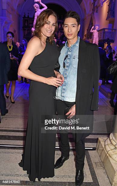 Yasmin Le Bon and Natt Weller attend the Samsung BlueHouse private view of the 'Alexander McQueen: Savage Beauty' exhibition at the Victoria & Albert...