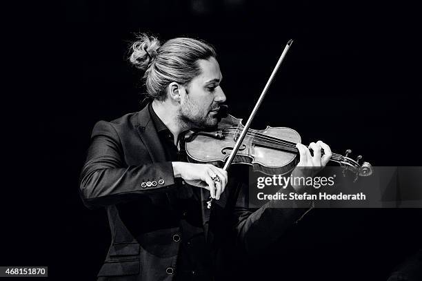 Violinist David Garrett performs live on stage during a concert at Philharmonie on March 30, 2015 in Berlin, Germany.