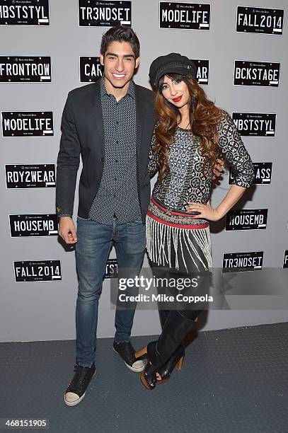 Model Francisco Escobar and Jackie Cruz attend the Mercedes-Benz Star Lounge during Mercedes-Benz Fashion Week Fall 2014 at Lincoln Center on...