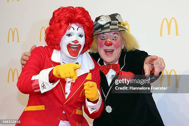 Clown Oleg Popov and Ronald McDonald pose during the new McDonald's Flagship Restaurant re-opening, at Frankfurt International Airport, Terminal 2,...