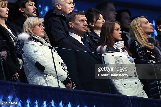 Prime Minister of Estonia Andrus Ansip, his wife Anu Ansip and their daughter cheer for the competitors of his country during the Opening Ceremony of...