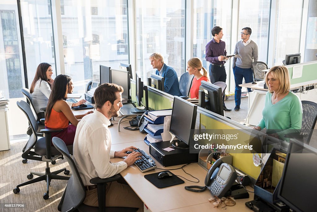 Multi-ethnic business people working together in office