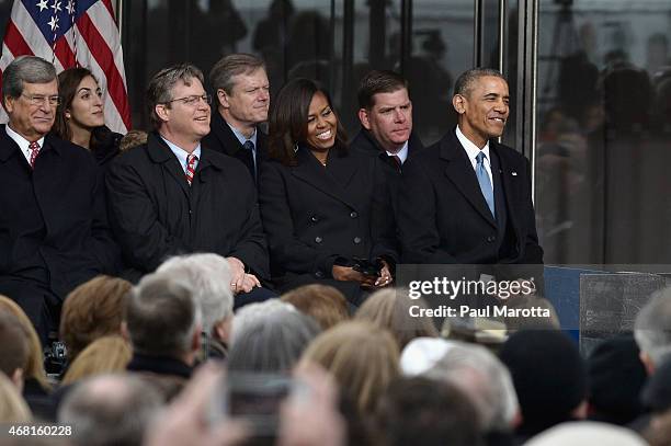 Trent Lott, Edward M. Kennedy Jr., Charles Baker, Michelle Obama, Martin J. Walsh, and President Barack Obama attend the dedication Ceremony at...