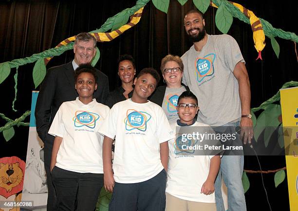 Mayor of Dallas Mike Rawlings, Kimberly Chandler, president and CEO of the U.S Fund for UNICEF Caryl Stern, UNICEF Ambassador Tyson Chandler, and...