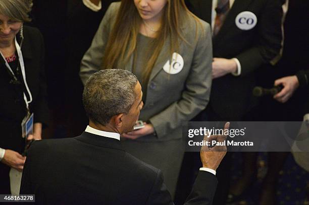 United States President Barack Obama speaks with college students at the Senate Chamber Dedication Ceremony in the the full scale replica of the...