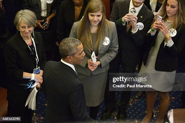 United States President Barack Obama speaks with college students at the Senate Chamber Dedication Ceremony in the the full scale replica of the...