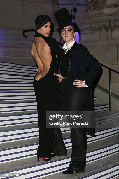 Ali Mahdavi and guest attend the 'Jean Paul Gaultier' exhibition opening cocktail at Grand Palais on March 30, 2015 in Paris, France.