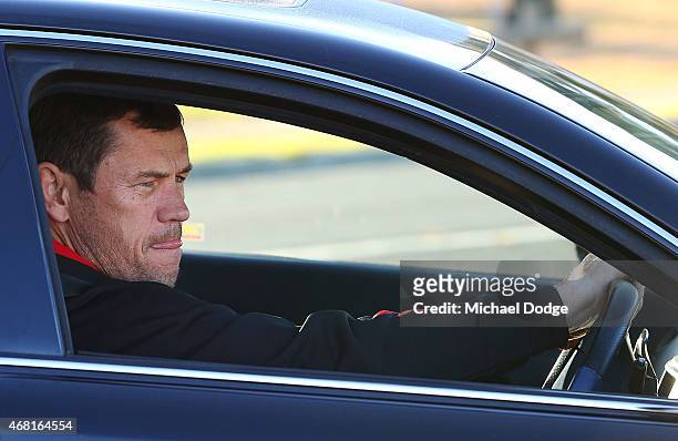 Bombers assistant coach Mark Harvey drives into the Essendon Bombers headquarters on March 31, 2015 in Melbourne, Australia. The AFL's anti-doping...
