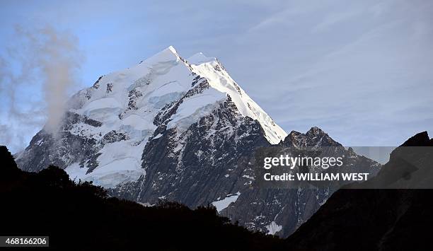 Photo taken on February 25 shows the peak of New Zealand's highest mountain Mount Cook- also known by it's Maori name of Aoraki - which sits in the...