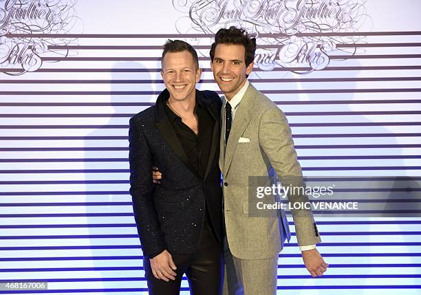 English Lebanon born singer Mika poses with Thierry-Maxime Loriot , the commissioner for the exhibition of French fashion designer Jean-Paul Gaultier...