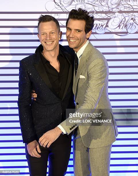 English Lebanon born singer Mika poses with Thierry-Maxime Loriot , the commissioner for the exhibition of French fashion designer Jean-Paul Gaultier...