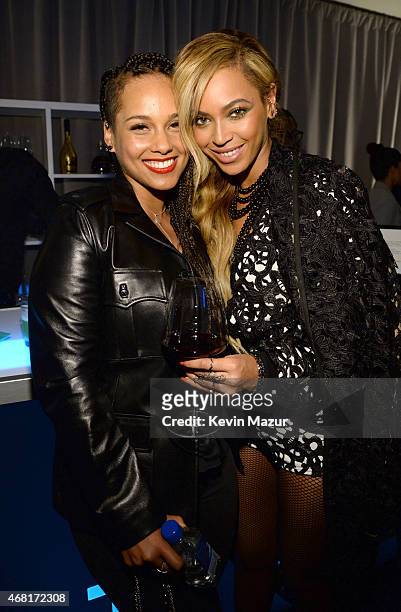 Alicia Keys and Beyonce attend the Tidal launch event #TIDALforALL at Skylight at Moynihan Station on March 30, 2015 in New York City.