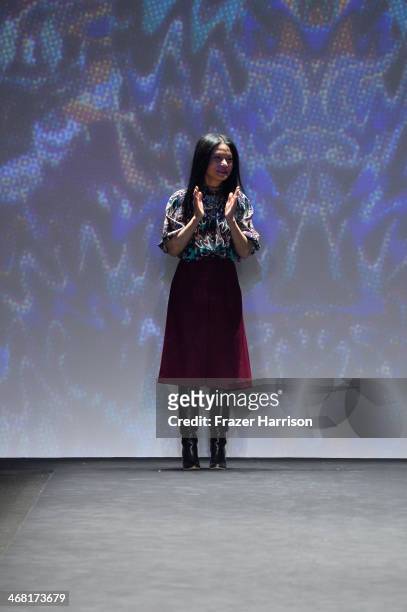 Designer Vivienne Tam poses on the runway with TRESemme at the Vivienne Tam fashion show during Mercedes-Benz Fashion Week Fall 2014 at The Theatre...