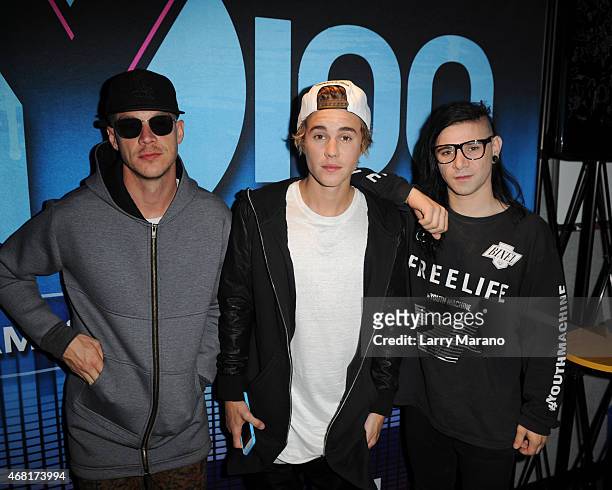 Diplo, Justin Bieber and Skrillex visit Y100 Radio Station on March 30, 2015 in Miami, Florida.