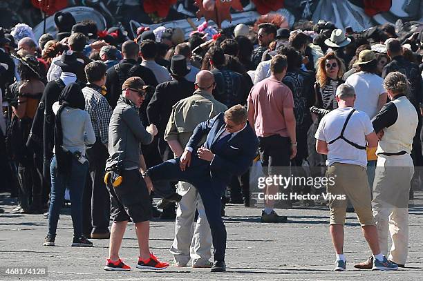 Stuntman of British actor Daniel Craig during the filming of the latest James Bond movie 'Spectre' at downtown streets of Mexico City on March 30,...