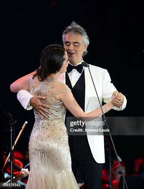 Maria Aleida and Andrea Bocelli onstage perform during the Miami Beach 100 Centennial Concert on March 26, 2015 in Miami Beach, Florida.