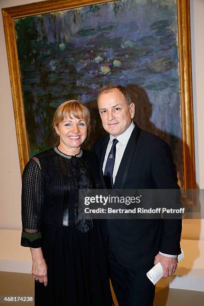 Chairman and Chief Executive Officer of Louis Vuitton, Michael Burke with his wife Brigitte Burke attend 'Les Clefs d'Une Passion' Exhibition Preview...