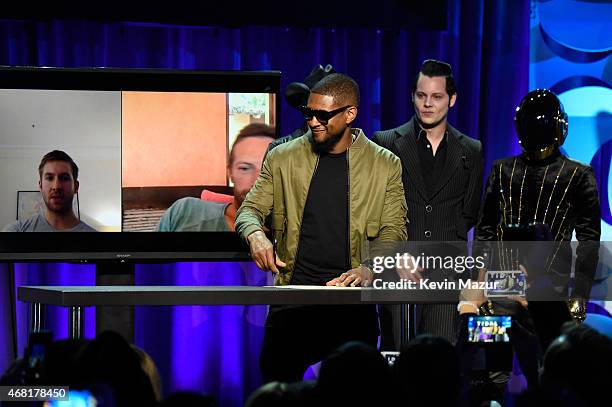 Usher attends the Tidal launch event #TIDALforALL at Skylight at Moynihan Station on March 30, 2015 in New York City.