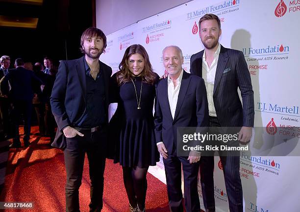 Dave Haywood and Hillary Scott of Lady Antebellum, Peter Frampton, and Charles Kelley of Lady Antebellum attend the T.J. Martell Foundation's 7th...