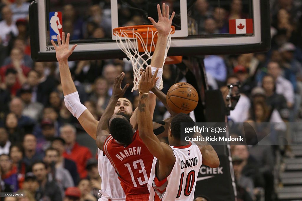 Houston Rockets Vs Raptors TORONTO - MARCH 30 - Raptors defence collapses on Houston's James ...