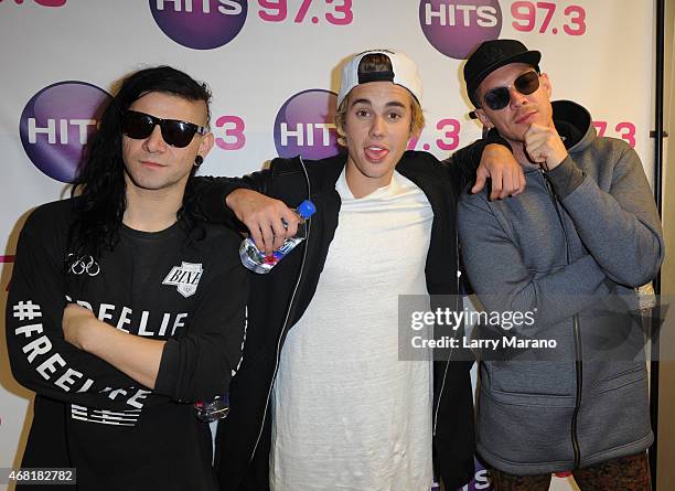 Skrillex, Justin Bieber and Diplo visit Hits 97.3 Radio Station on March 30, 2015 in Miami, Florida.