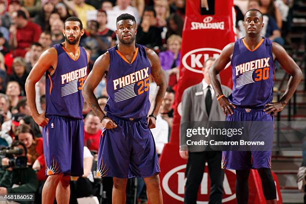 Brandan Wright, Earl Barron and Reggie Bullock of the Phoenix Suns during the game against the Portland Trail Blazers on March 30, 2015 at Moda...