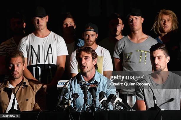 Jobe Watson the captain of the Bombers, flanked by his team mates talks to the media at the Pullman Hotel on March 31, 2015 in Melbourne, Australia....