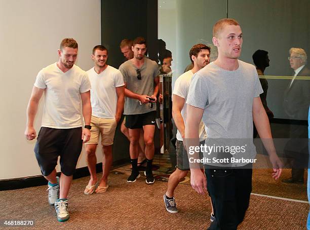 Players from the Bombers leave after speaking to the media at the Pullman Hotel on March 31, 2015 in Melbourne, Australia. The AFL anti-doping...