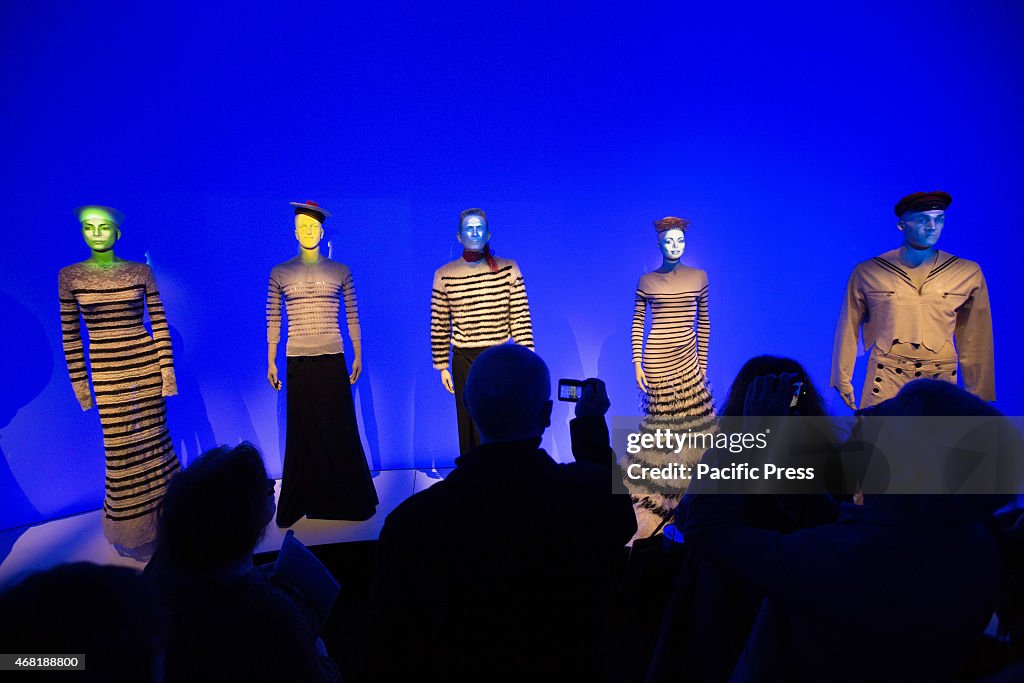 A mannequin with the facial features of French fashion...