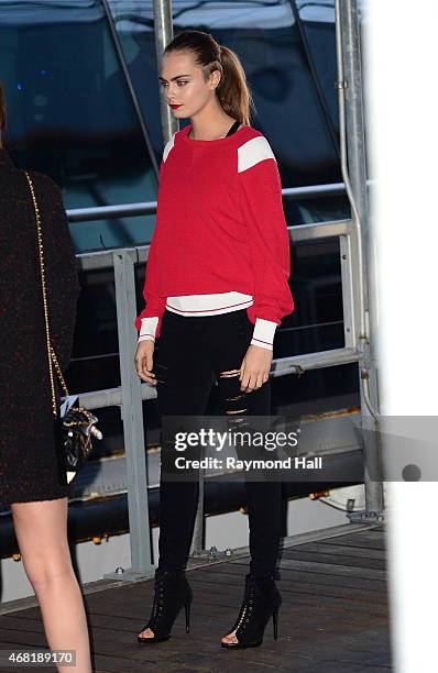 Model Cara Delevingne and Dakota Johnson are seen Chanel Party on Yacht at Chelsea Pier on March 30, 2015 in New York City.