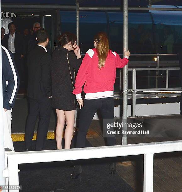 Model Cara Delevingne and Dakota Johnson are seen Chanel Party on Yacht at Chelsea Pier on March 30, 2015 in New York City.