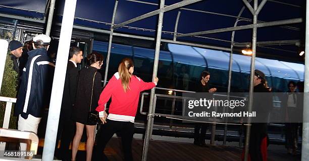 Model Cara Delevingne and Dakota Johnson are seen Chanel Party on Yacht at Chelsea Pier on March 30, 2015 in New York City.